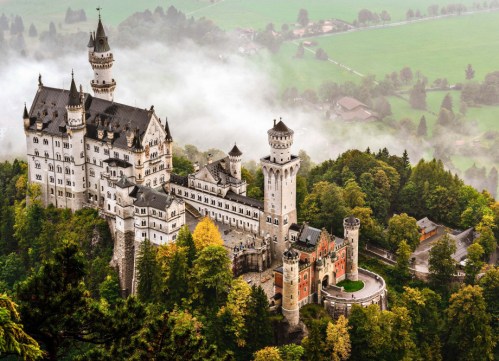 neuschwanstein-castle-shrouded-in-mist-in-the-bavarian-alps-of-germany-shutterstock_157079090-2